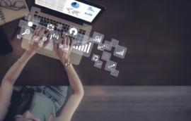woman working with data on laptop