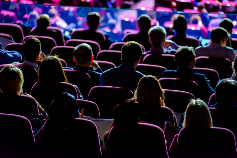 Audience at conference hall.
