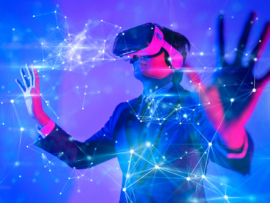 A business person uses virtual reality to access the metaverse.
