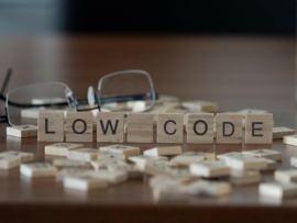 Wood tiles that say low-code.