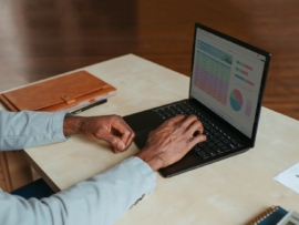 A freelancer working on a computer.